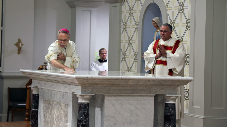 New altar is blessed to celebrate 25th anniversary of church building at St. Michael.