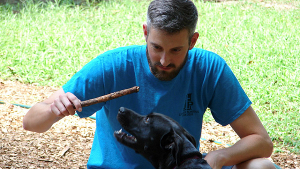 Father Michael Schuetz with Bella