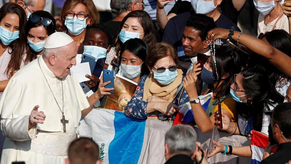 Pope Francis greets the crowd as he arrives for his general audience in the San Damaso courtyard at the Vatican Sept. 16, 2020. (CNS photo/Yara Nardi, Reuters)