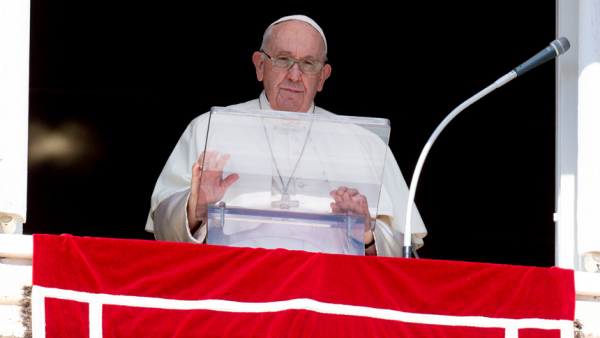 Pope Francis leads the Angelus from the window of his studio overlooking St. Peter's Square at the Vatican Oct. 2, 2022. The pope begged Russian President Vladimir Putin to stop the war in Ukraine and condemned Russia's annexation of four Ukrainian regions. He also called upon Ukrainian President Volodymyr Zelenskyy to be open to serious peace proposals. (CNS photo/Vatican Media)