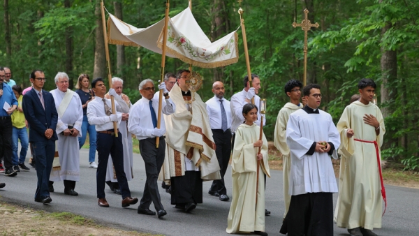 Carrying the Eucharist: St. Michael Parish holds procession at sunset